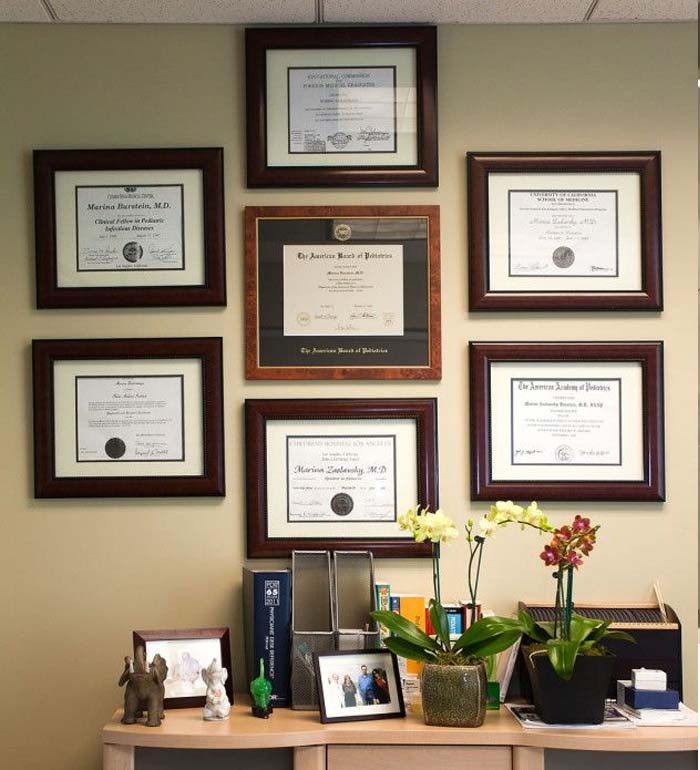 hang qualifications up large home office wall