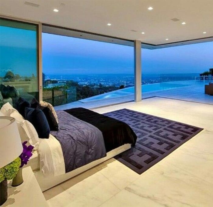 large window on bedroom wall for him